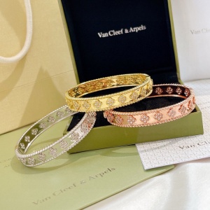 $42.00,Van Cleef & Arpels Gold and Diamond Perlée Bangle Bracelet # 265297